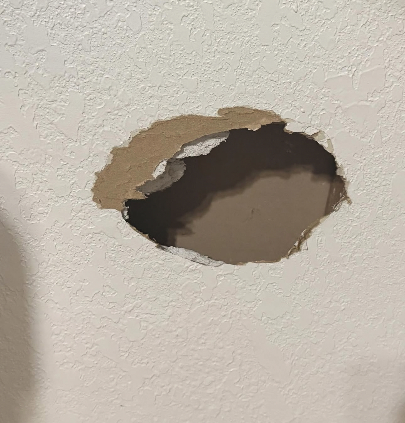 Large drywall ceiling hole repair in DFW home