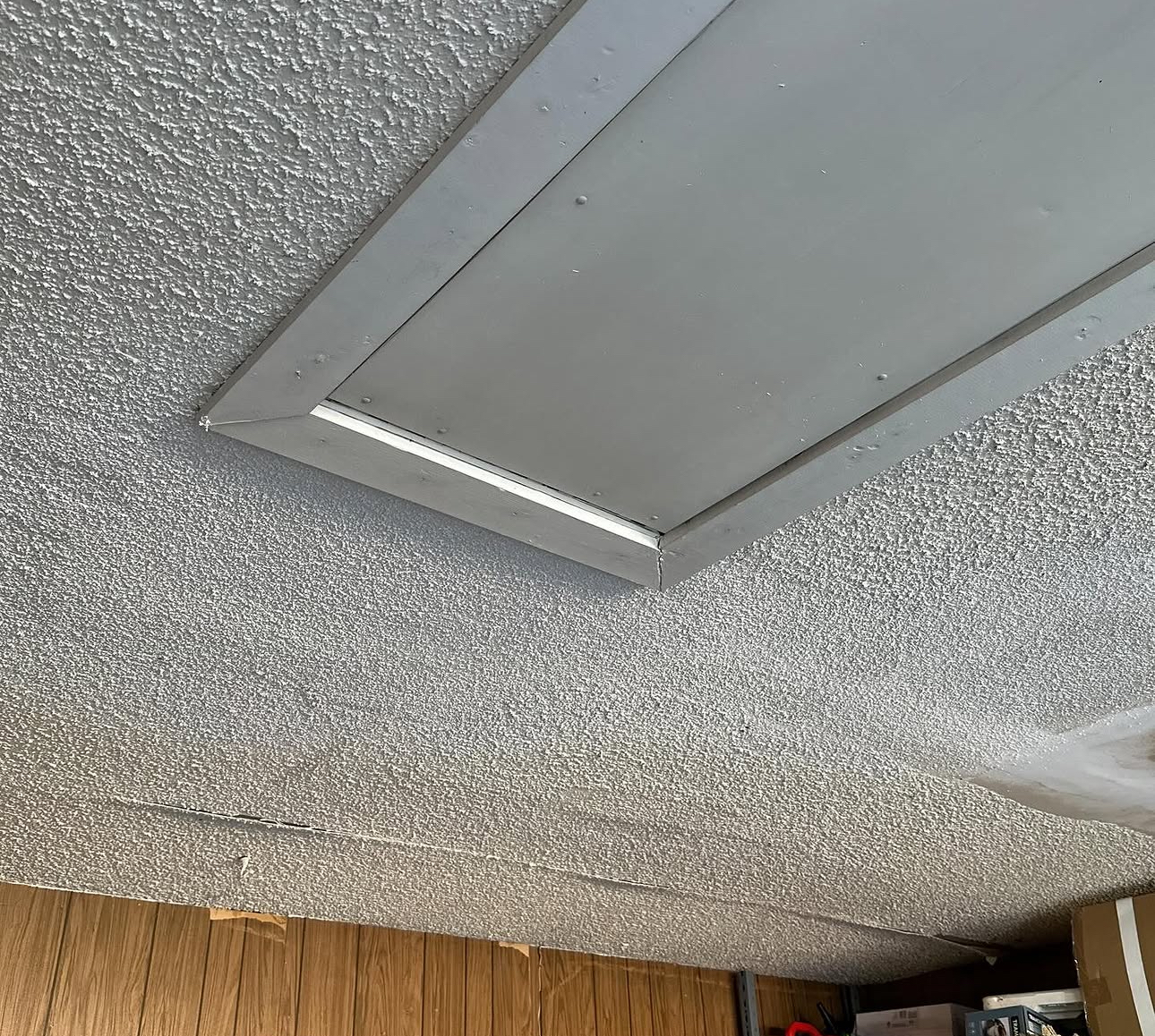 Garage ceiling drywall around light fixture repair